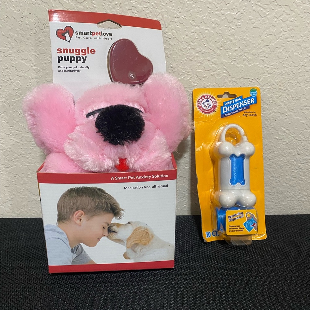 Snuggle puppy and rewinding waste bag dispenser